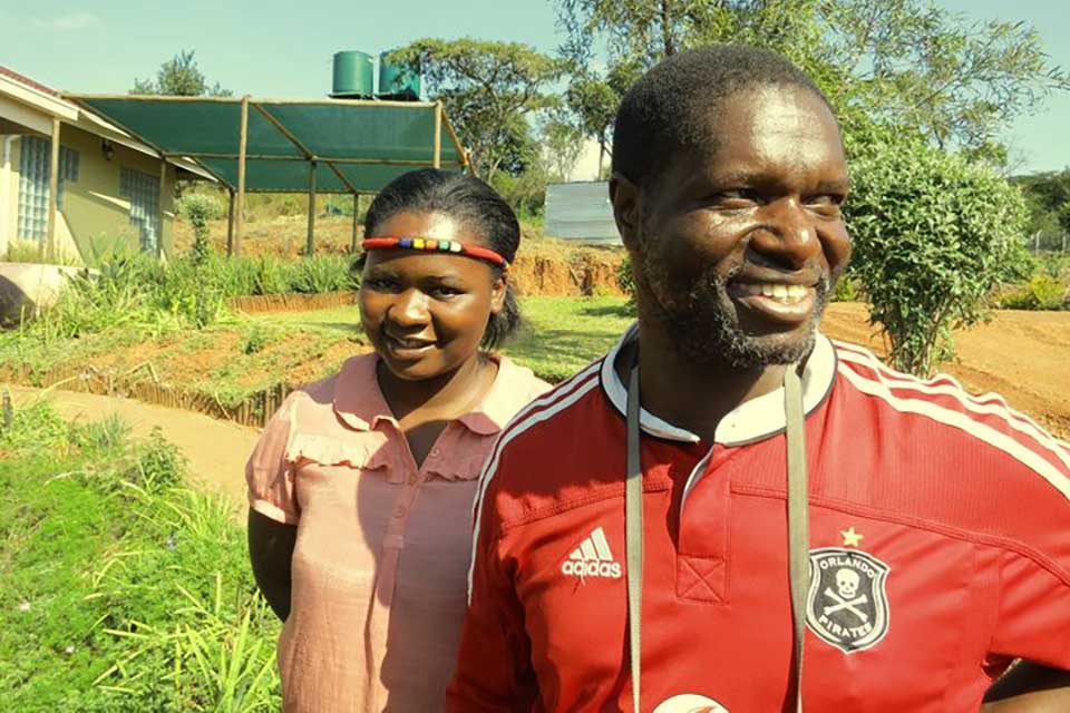 Vonani Bila and his wife at Timbila Writer's retreat center in Shirley village.