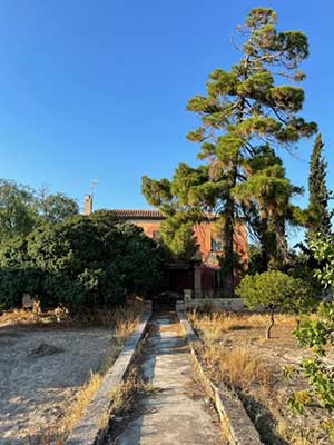 A photograph of Anghelaki-Rooke's house