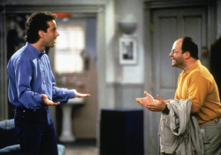 A photo still from the show Seinfeld featuring Jerry Seinfeld (played by Jerry Seinfeld) and George Constanza (played by Jason Alexander)