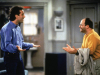 A photo still from the show Seinfeld featuring Jerry Seinfeld (played by Jerry Seinfeld) and George Constanza (played by Jason Alexander)