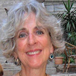 A photograph of reviewer Michele Levy