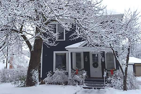 A house covered in snow.