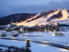 A snowy hillside landscape with the city of PyongCheong at its base.